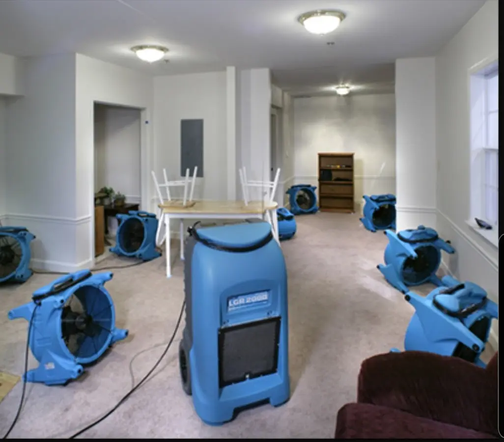 Air movers and dehumidifier setup for Water Damage Restoration in Kosciusko